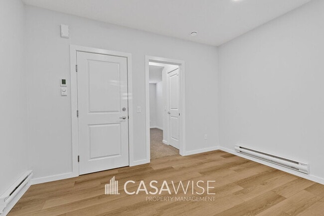 Photo - 21039-21025 25 Ave NW