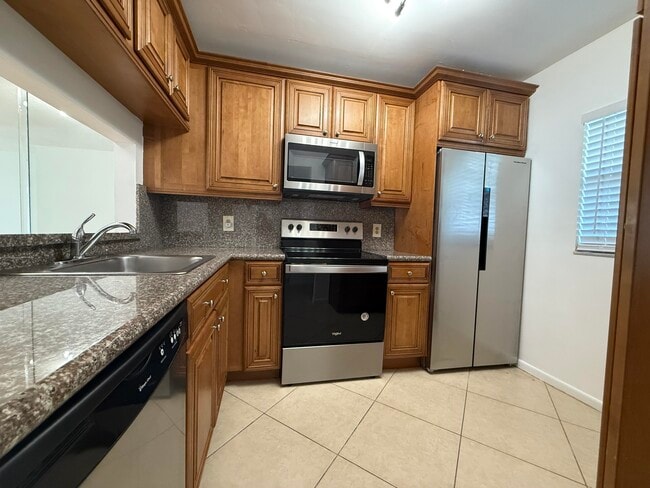 Photo - 6820 Palmetto Cir S Unit 103