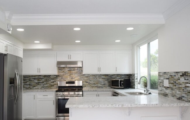 Photo - Flexible Lease Terms! Stunning 4BR/2.5BA Two-Story Renovated Townhome in UTC!