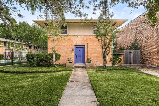 Building Photo - 4018 Blue Bonnet Blvd Unit A