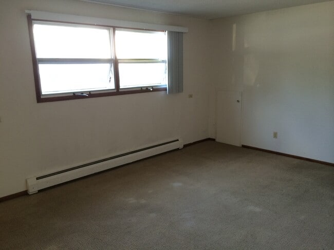 Building Photo - 1243 4th Ave SW Unit 1