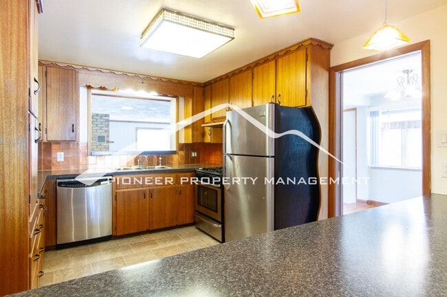 Photo - Spacious Home on Quiet Street with 2 Car Garage and Central A/C