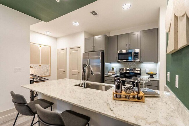 Photo - Move-In Special! 8 Weeks Free + $500 Off Unit AST1