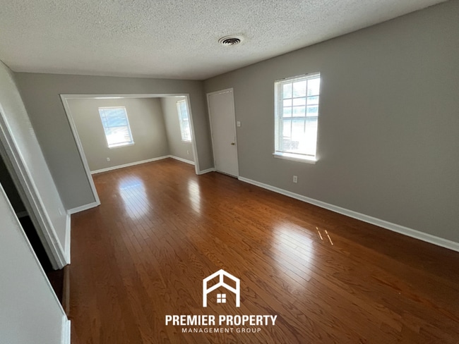 Photo - Charming 3BR Home in 38118 | Hardwood Floors & Spacious Fenced Backyard
