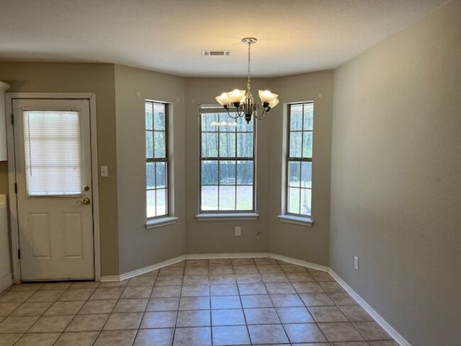 Photo - Introducing a charming 3-bedroom, 2-bathroom house located in the desirable area of Russellville,...