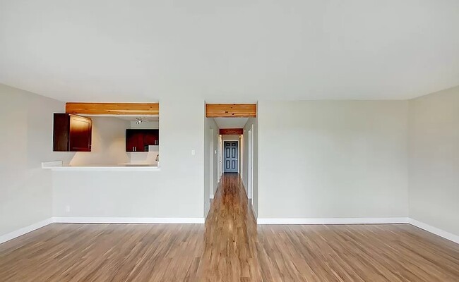 Living room to entrance - Thunderbird Apartments