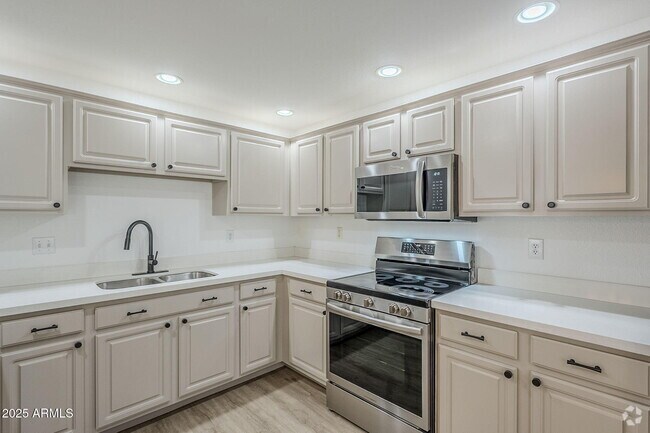Building Photo - 9455 E Raintree Dr Unit 1026 Rental