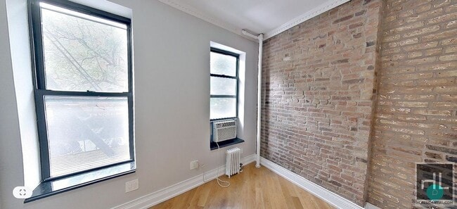Building Photo - E 10TH ST. Rental