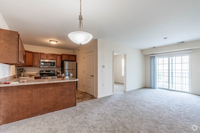 2BR,1BA - 825SF - Living. Dining Area - Glenwood Square Senior Apartments