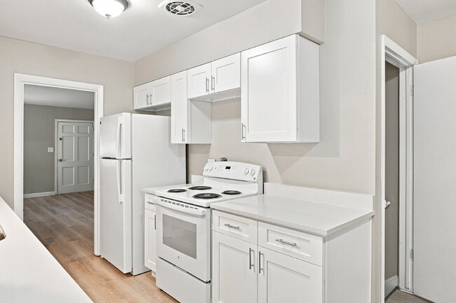 Photo - $2,240.95 with $300 Off the first month's rent, 4 Beds, 2 Baths, Triplex Unit in Littleton with W... Unit #5565