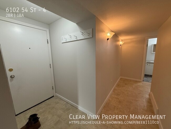 Photo - Recently renovated two-bedroom, one-bathroom suite with UTILITIES INCLUDED in Taber!! Unit 4
