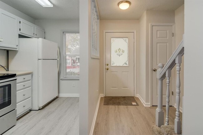 Photo - Move-In Ready 2BR/1.5BA Townhome with Wate...