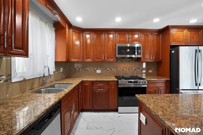 Photo - 7151 Hamlin Ave