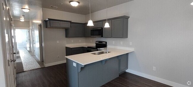 Building Photo - LIKE NEW TOP FLOOR HERRIMAN CONDO - AVAILA... Unit 301