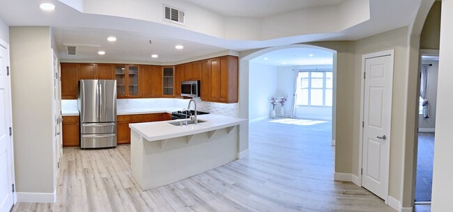 Panoramic photo of kitchen and grand room - 30 E Julian St Unit 210 Rental
