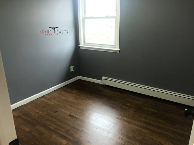 Photo - 75-03 Astoria Blvd N