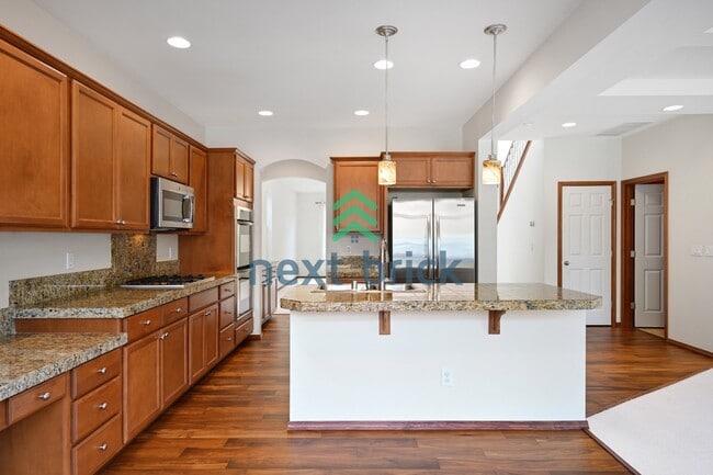 "Charming 4-Bed Kenmore Haven: Spacious 2,440 Sq Ft with 2.5 Baths!"