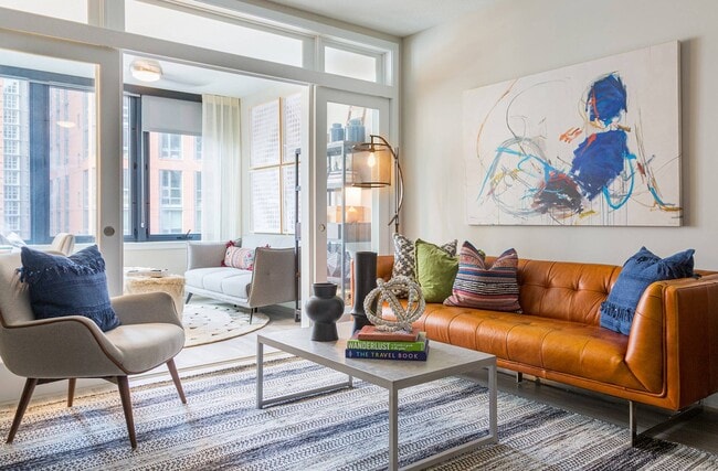 Open Floor Plan With Large Living Space, Sun Room and Over-Sized Windows - Meridian on First