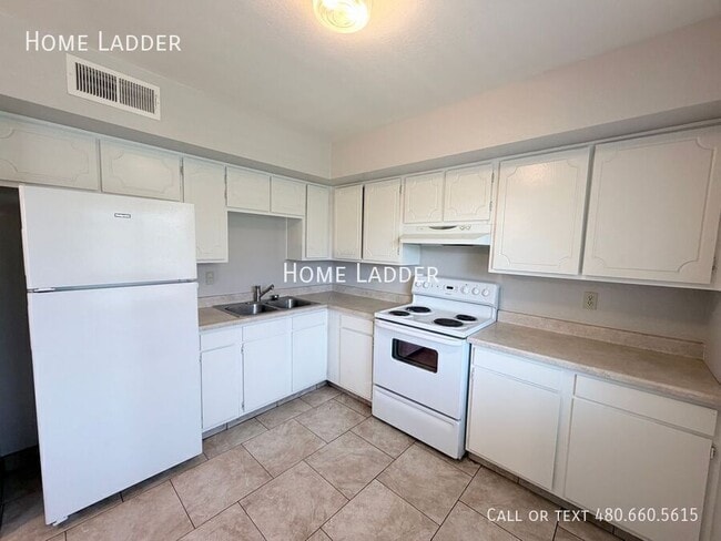 Building Photo - 501 E 8th Ave Unit 1