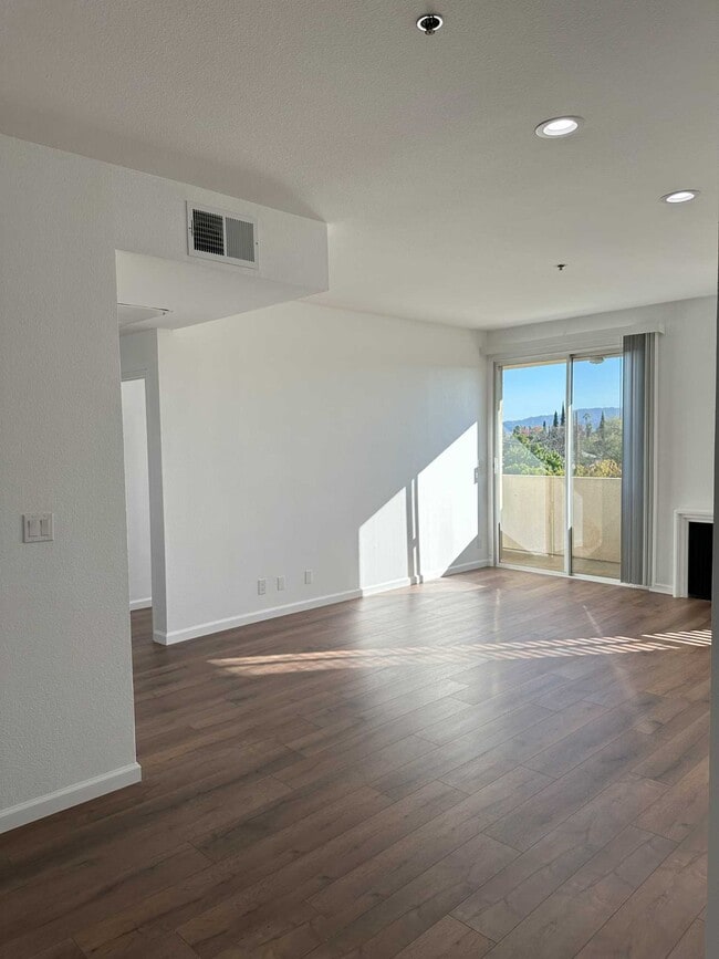 Building Photo - 19350 Sherman Way Unit 208