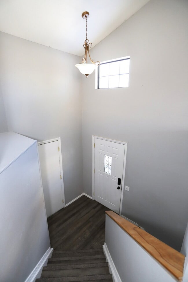 Photo - Spacious 4-Bedroom Home with Open Concept Living, Mountain Views & Fenced Yard