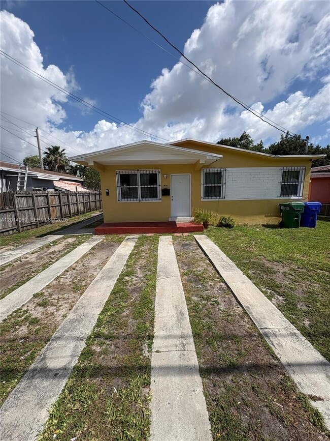 Building Photo - 1491 NW 56th St Unit 1493