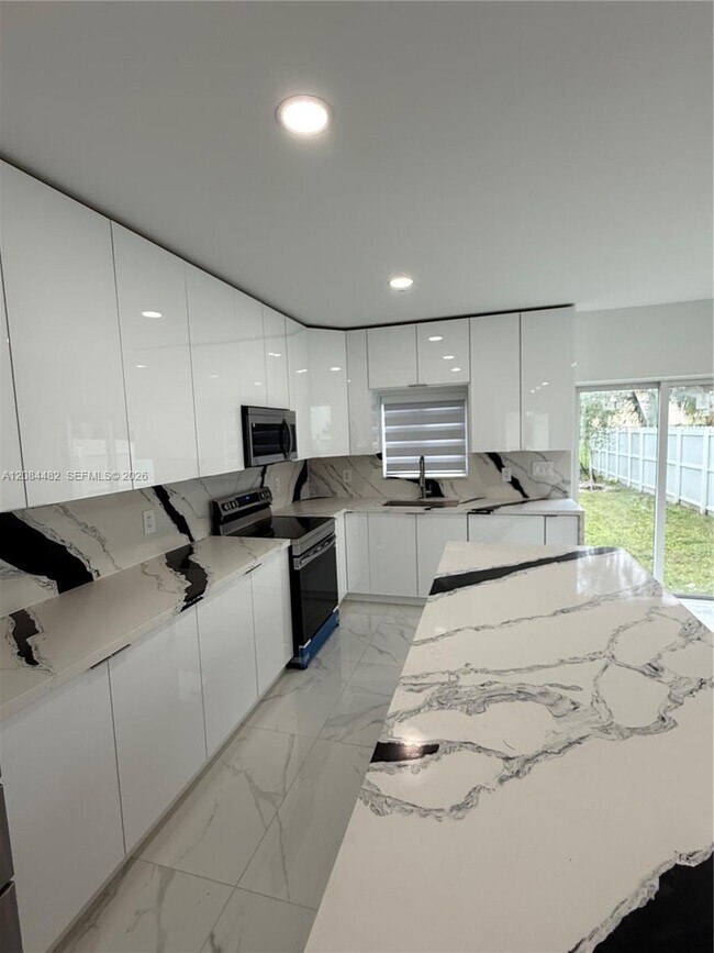 Northwest 102nd Street, Miami, FL 33147 - 3 BR 2.5 BA multi-family home
