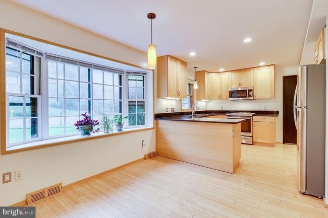 Photo - This elegant and unique three-level split ...