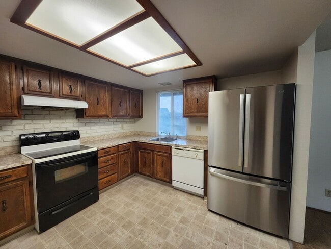 Photo - Spacious One Level 4 Bedroom, All New Kitchen Appliances, Landscaping Included!