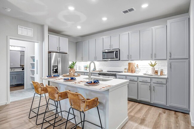 kitchen featuring sink - The Grove at Clermont Apartments