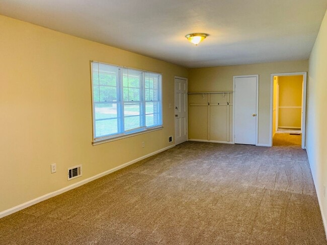 Photo - Wow, great location, newly renovated, 4 beds/2 bath, private fenced yard, sun room/office, must see!