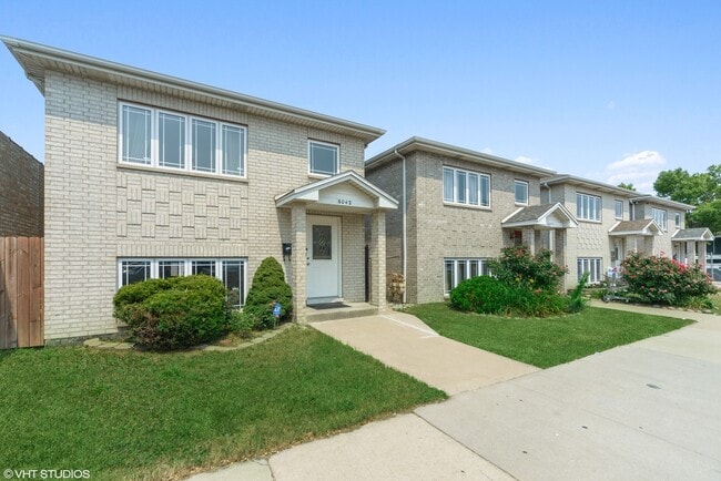 Building Photo - 6042 W 63rd St Unit 2