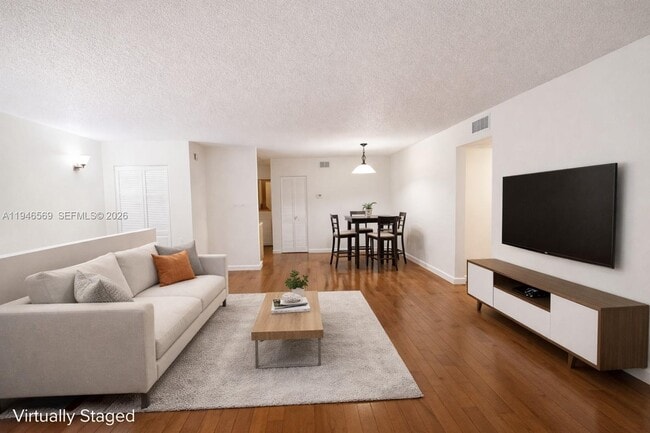 Building Photo - 102 Gardens Dr Unit 204