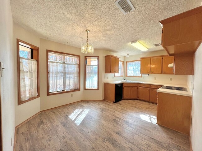 Photo - Available now! 3/2/2 with fenced backyard and small sunroom