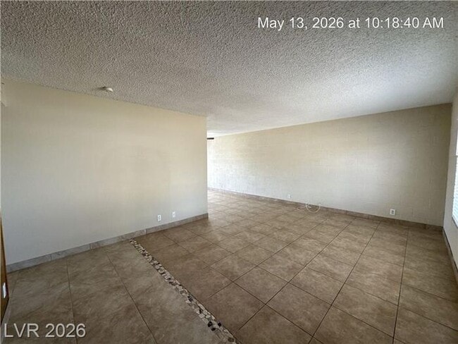 Photo - Cozy 4-Bedroom Home Near Las Vegas Strip with Large Yard & Covered Patio