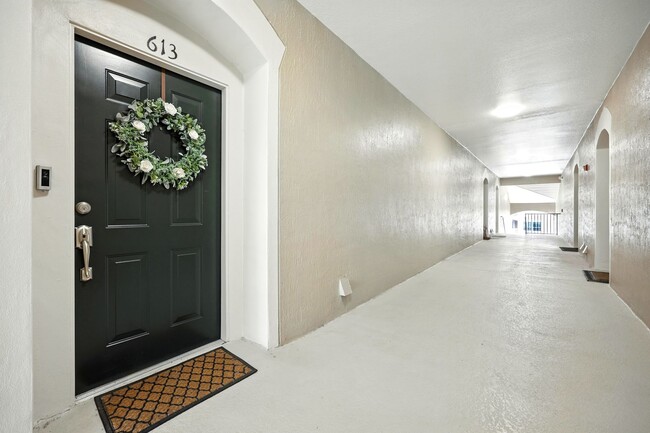 Photo - Bright Top-Floor Condo in Resort-Style Gated Community Unit 613