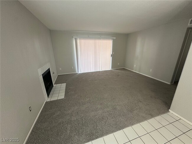 Building Photo - 5000 Red Rock St Unit 122