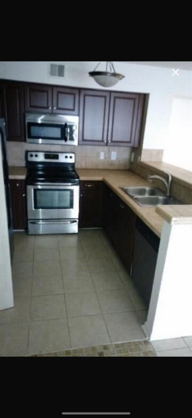Building Photo - 1749 Village Blvd Unit 103 Rental