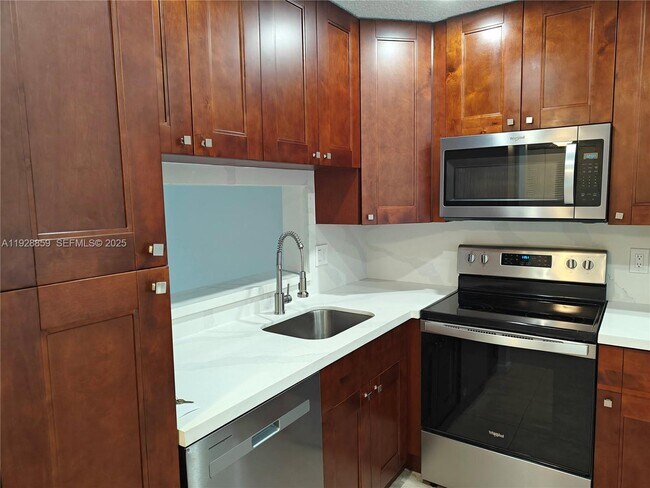 Photo - 8770 Royal Palm Blvd Unit 203-2