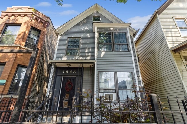Building Photo - 1845 N Albany Ave Unit 1