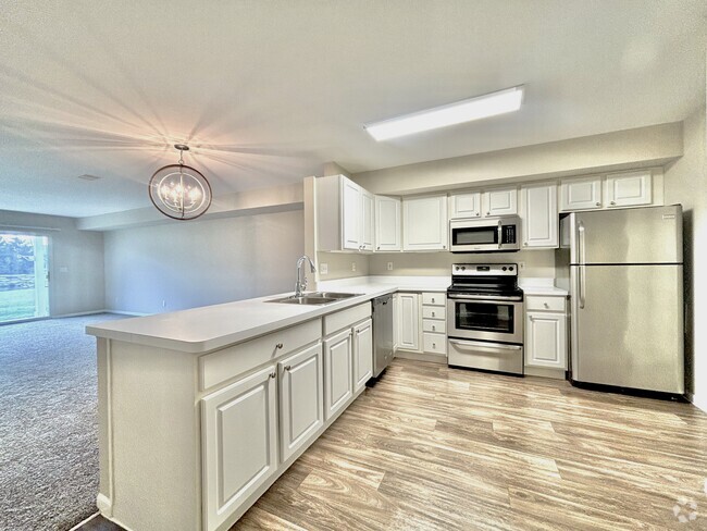 White Kitchen Cabinets - Keystone Lake Apartments