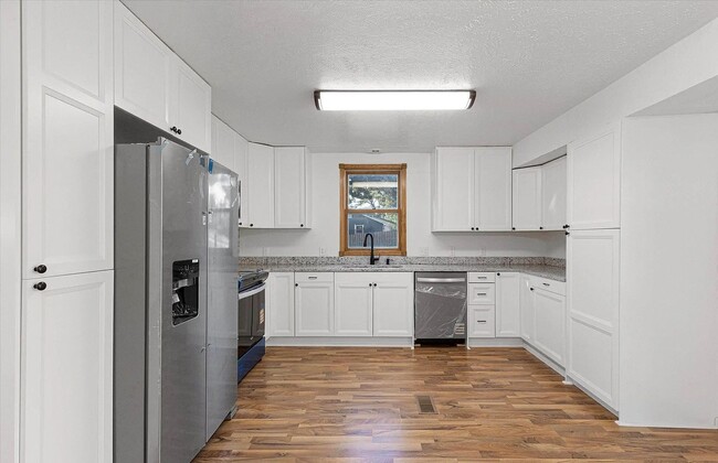 Photo - Cozy elegance meets modern convenience in ...