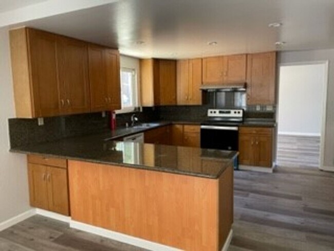 Photo - -Spacious 4 Bed 2.5 Bath, House, with Hew Hardwood Floors throughout -