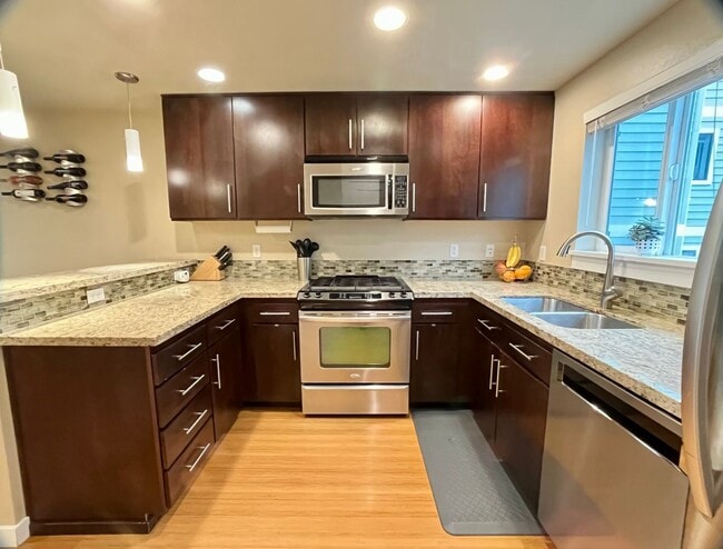 Photo - Stylish Greenwood Townhome with Private Patio & Modern Finishes