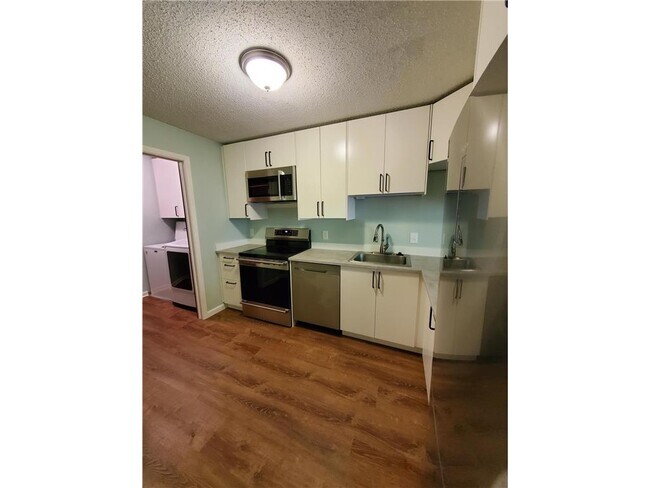 Building Photo - 5697 Green Cir Dr Unit 206 Rental