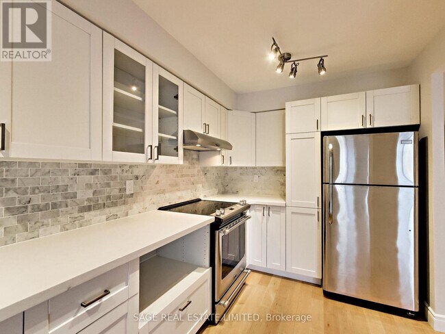 Photo - 24 Wellesley St W Unité 714