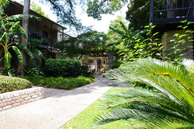 Manicured gardens and mature trees - The Bordeaux Apartments