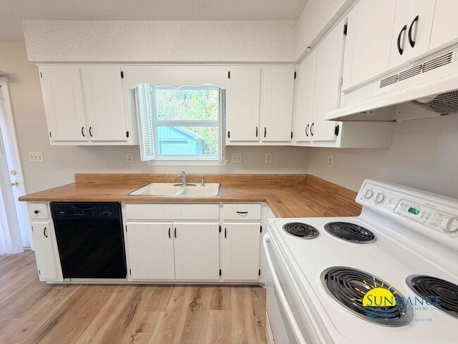 Photo - Newly Renovated 3 Bedroom with Oversized detached workshop/garage!