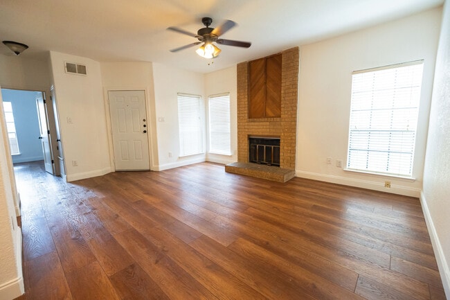Bright and spacious living room with wide windows - 11609 April Dr Unit A