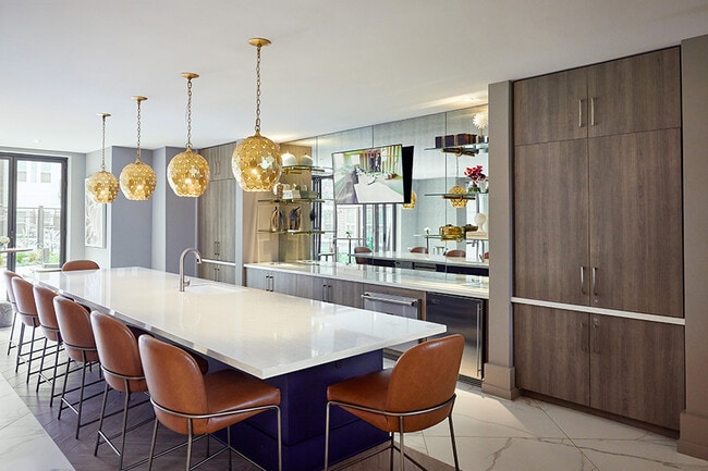Host friends at the entertainment kitchen - Passport Apartments